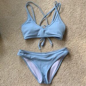 Light blue rubbed bikini swim suit set matching with adjustable straps on top
